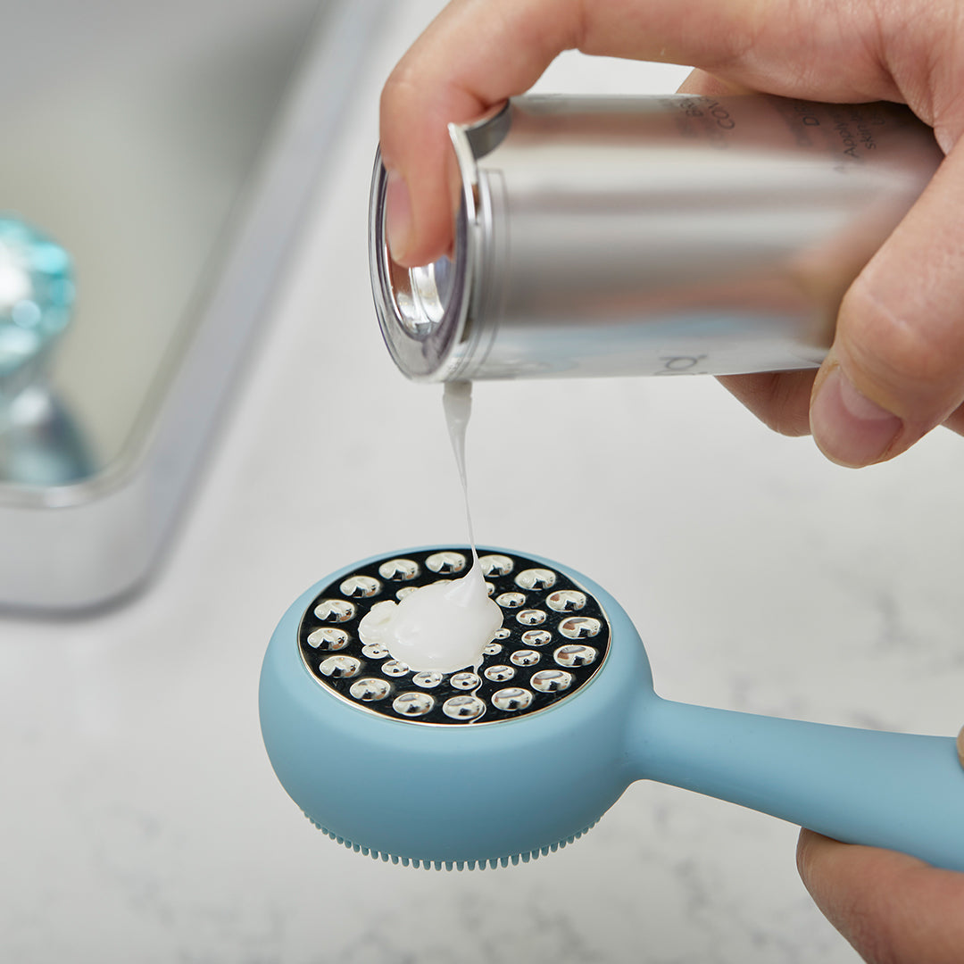 hover-image?renew HydratingPeptides™ Serum being pumped on to the back of a PMD Clean Pro Silver