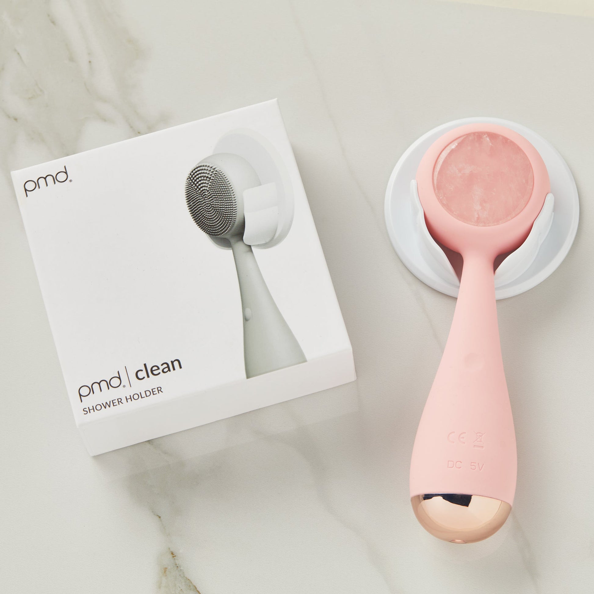 4002-Holder?PMD Clean Pro RQ in holder next to packaging