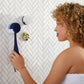 4003-Holder?Woman holding PMD Clean Body and placing on  Shower Holder