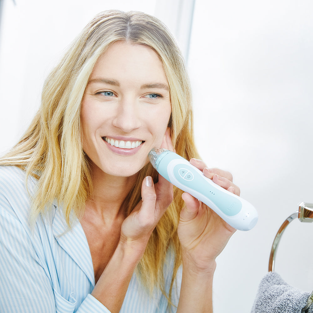 1005-Sky?Woman using Personal Microderm Elite Pro