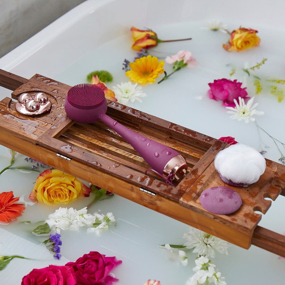 AT-4003-EBerry?Berry PMD Clean Body on bath tray surrounded by flowers