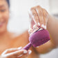AT-4003-MBerry?Woman removing relax Body Massager Replacement on PMD Clean Body in berry