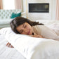 5008?Woman sleeping on white silversilk pillowcas