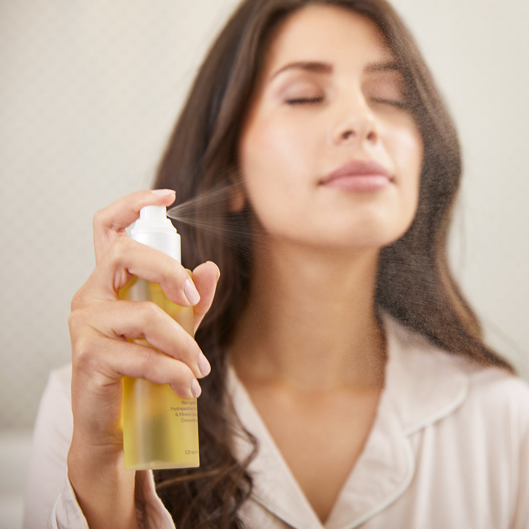 1022-N?Woman spraying soothe Multivitamin Nourishing Toner on her face